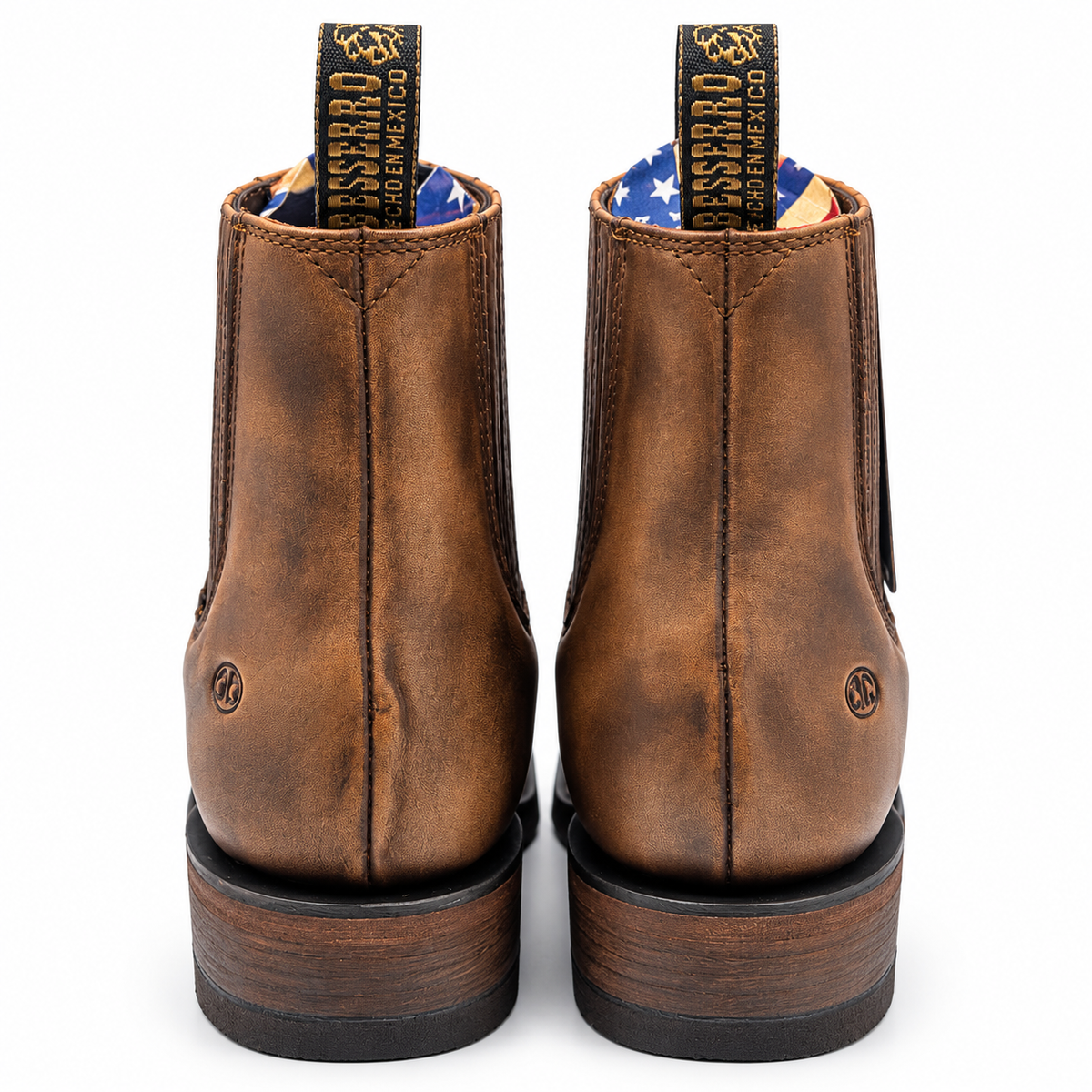 Rear view of Besserro 6440 polished leather boots in Brown Tint