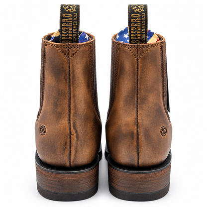 Rear view of Besserro 6440 polished leather boots in Brown Tint
