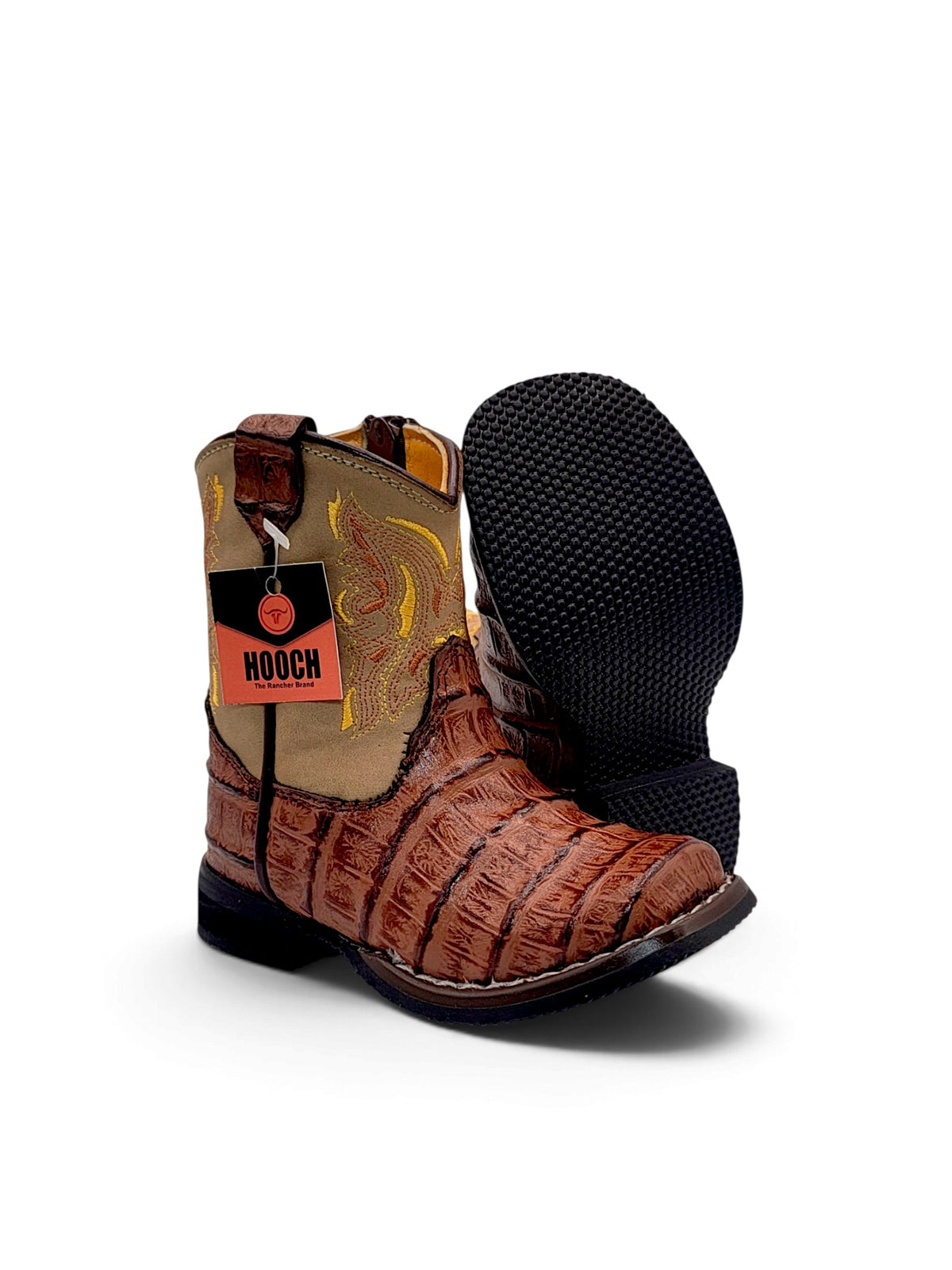 H541 Cognac baby Western boots showing the textured rubber outsole