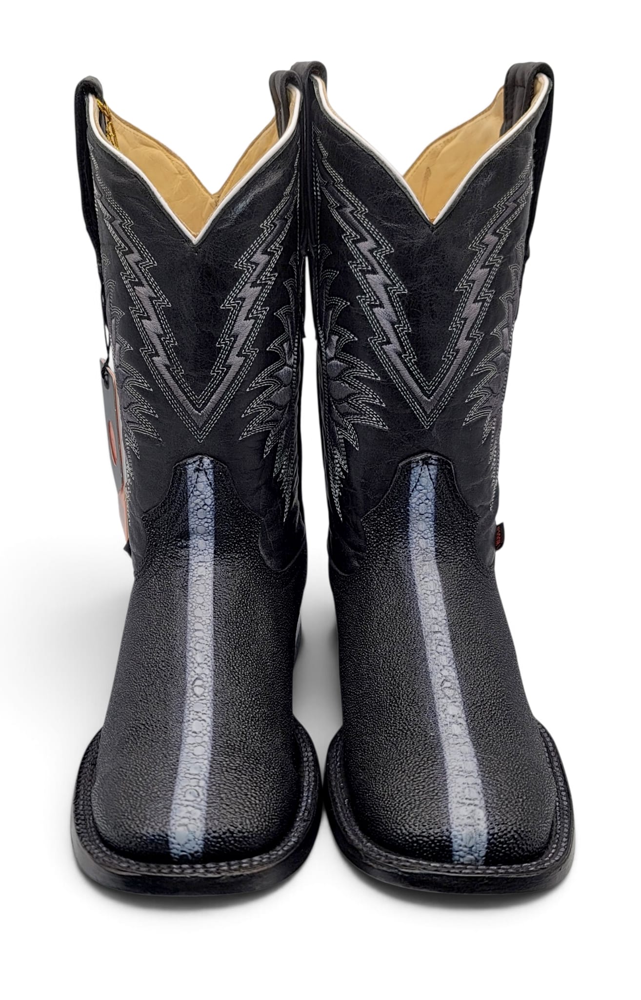 Front view of men’s black stingray-print wide square toe Western boots