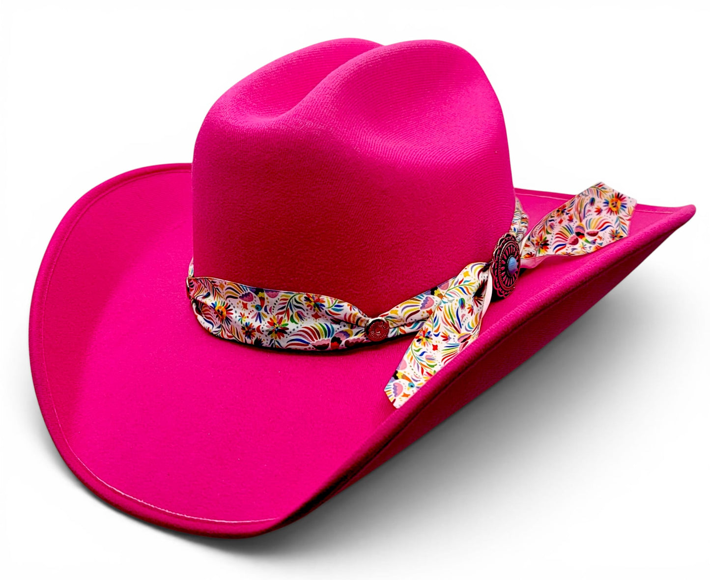 Women’s fuchsia faux felt cowgirl hat with floral Charlie hat band, three-quarter view